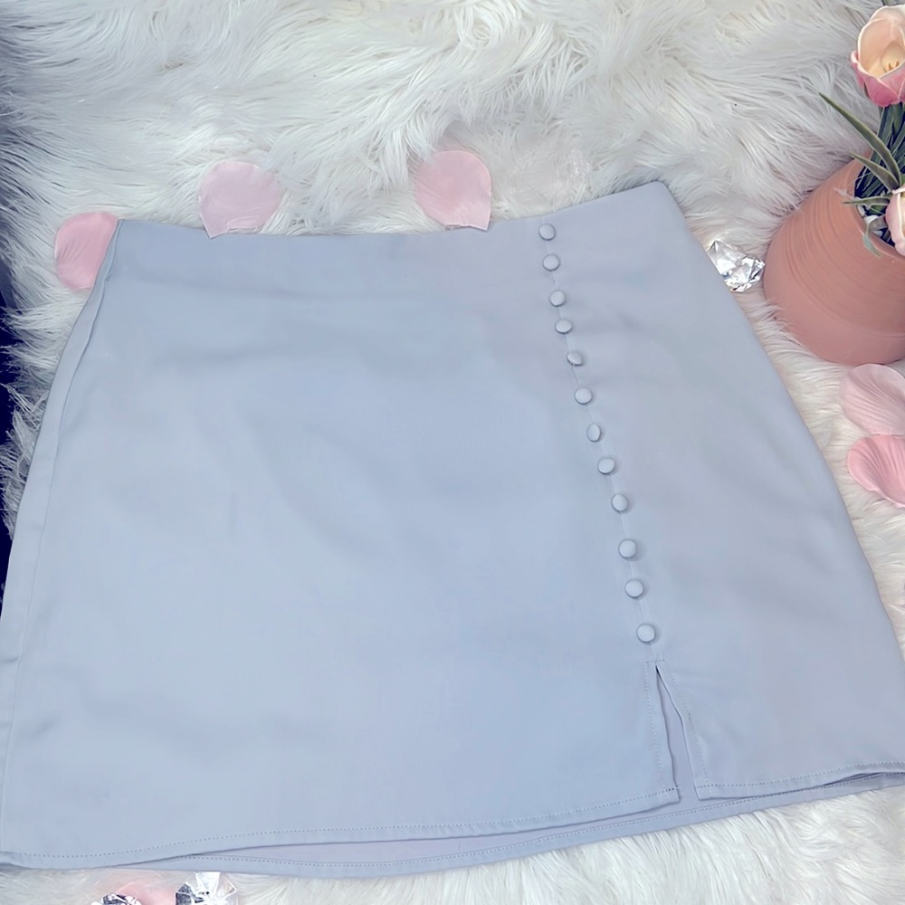 Hottie 🔥blue buttons silk mini skirt.